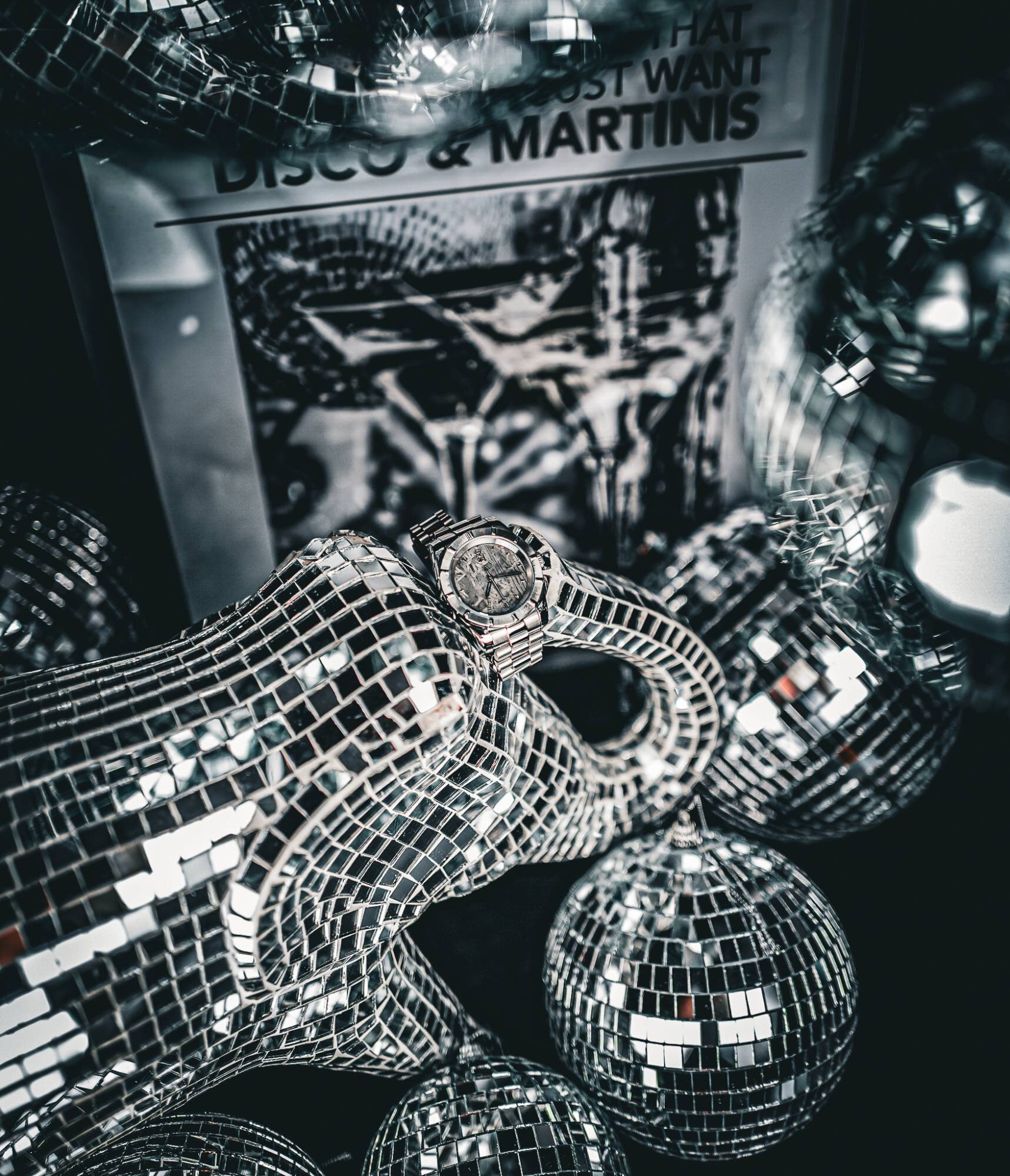 The Disco-Baller held in the trunk of a mirror-tiled elephant among disco balls